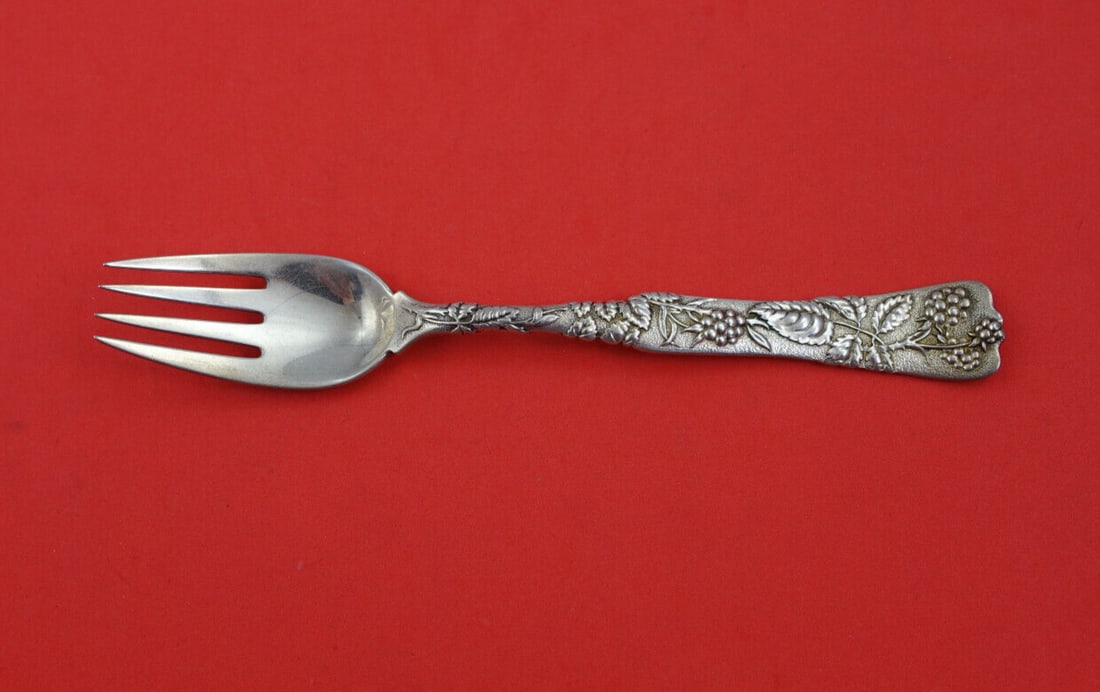 Tiffany Vine Sterling Silver Fork 7 Inch Raspberry Motif Rare: Tiffany Vine Sterling Silver Fork 7 Inch Raspberry Motif Rare Discover a rare piece of culinary elegance with the Vine by Tiffany Sterling Silver Salad/Fish Fork, measuring 7 inches. Crafted from fine