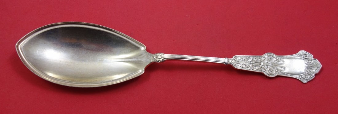 Whiting Alhambra Sterling Silver Berry Spoon Gold Wash 9 1/4": Whiting Alhambra Sterling Silver Berry Spoon Gold Wash 9 1/4" Presenting the Alhambra pattern by Whiting, this exquisite berry spoon is crafted from sterling silver and features a beautiful gold wash 
