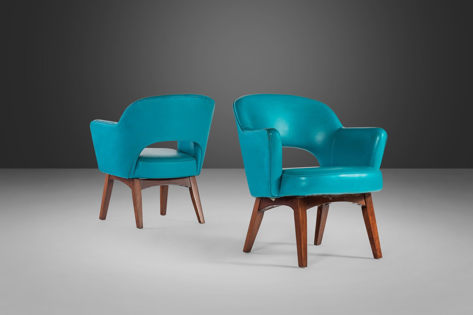 Rare 1960s Patrician Furniture Teal Vinyl Lounge Chairs Set of 2: Rare 1960s Patrician Furniture Teal Vinyl Lounge Chairs Set of 2 Discover a rare set of two lounge chairs by Patrician Furniture, featuring original teal vinyl upholstery and sturdy walnut legs, craft