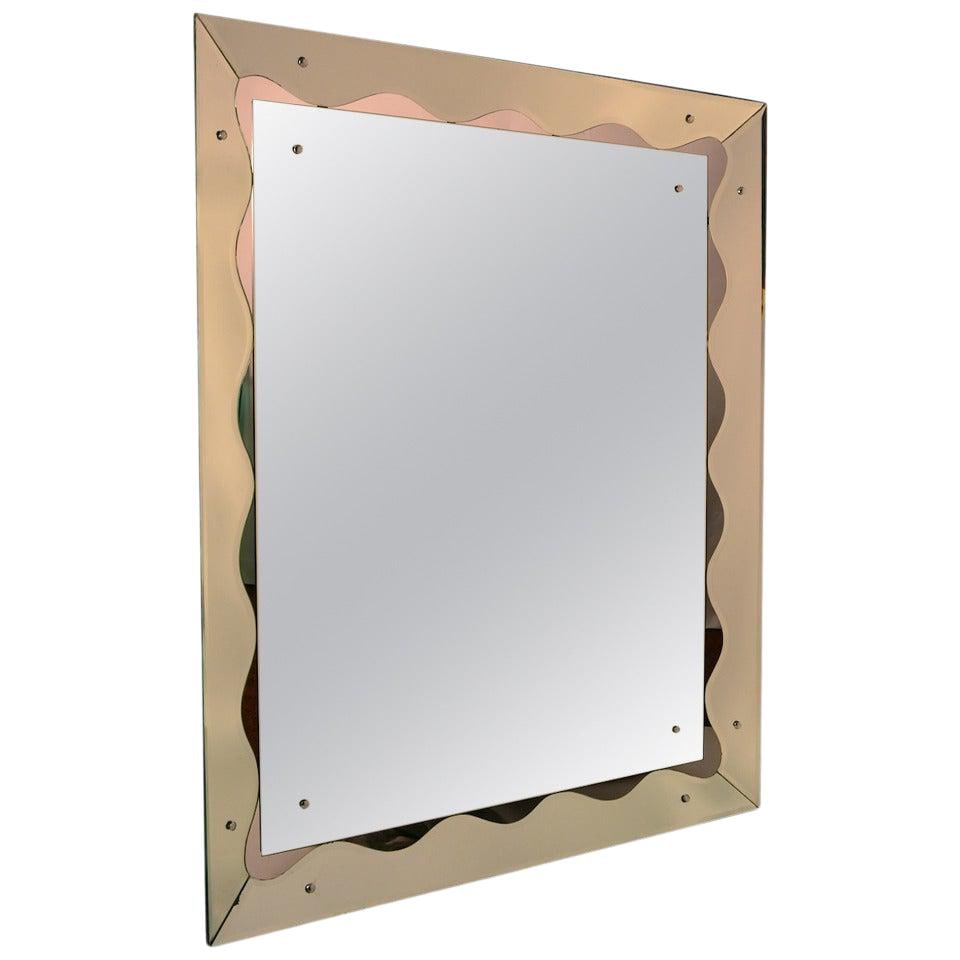 Elegant Large Venetian Mirror with Openwork Frame: Elegant Large Venetian Mirror with Openwork Frame This exquisite Large Venetian Mirror features a stylish lyrical openwork frame that beautifully surrounds a bevelled interior plate glass mirror. It i
