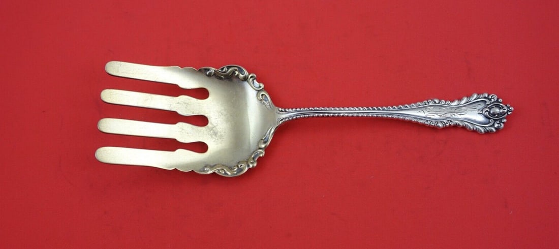 Dominick & Haff Mazarin Sterling Silver Asparagus Fork Goldwashed 9 1/4": Dominick & Haff Mazarin Sterling Silver Asparagus Fork Goldwashed 9 1/4" This exquisite asparagus fork is crafted from sterling silver and features a stunning goldwashed finish. The fork, measuring 9 