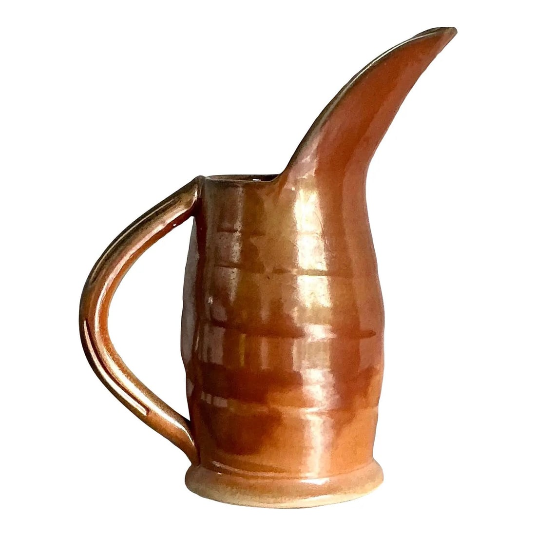Peter Rose Boho Amber Glazed Ceramic Pitcher Mid Century Artisan Pottery: Peter Rose Boho Amber Glazed Ceramic Pitcher Mid Century Artisan Pottery This vintage ceramic pitcher by Peter Rose features a distinctive Boho design from the mid-20th century. The piece is crafted w