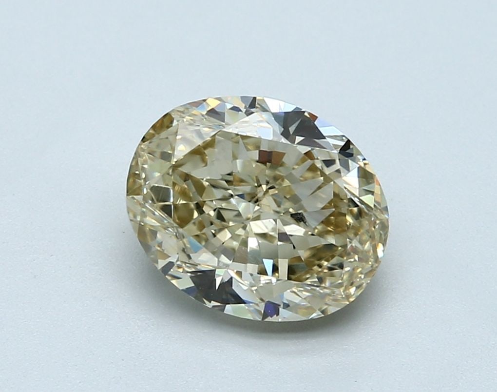 Loose Diamond - OVAL 3.04ct Fancy Light Brownish Yellow SI1: Loose Diamond - OVAL 3.04ct Fancy Light Brownish Yellow SI1 Source: Natural Shape: OVAL Carats: 3.04 Color: Fancy Light Brownish Yellow Certification: GIA Video: