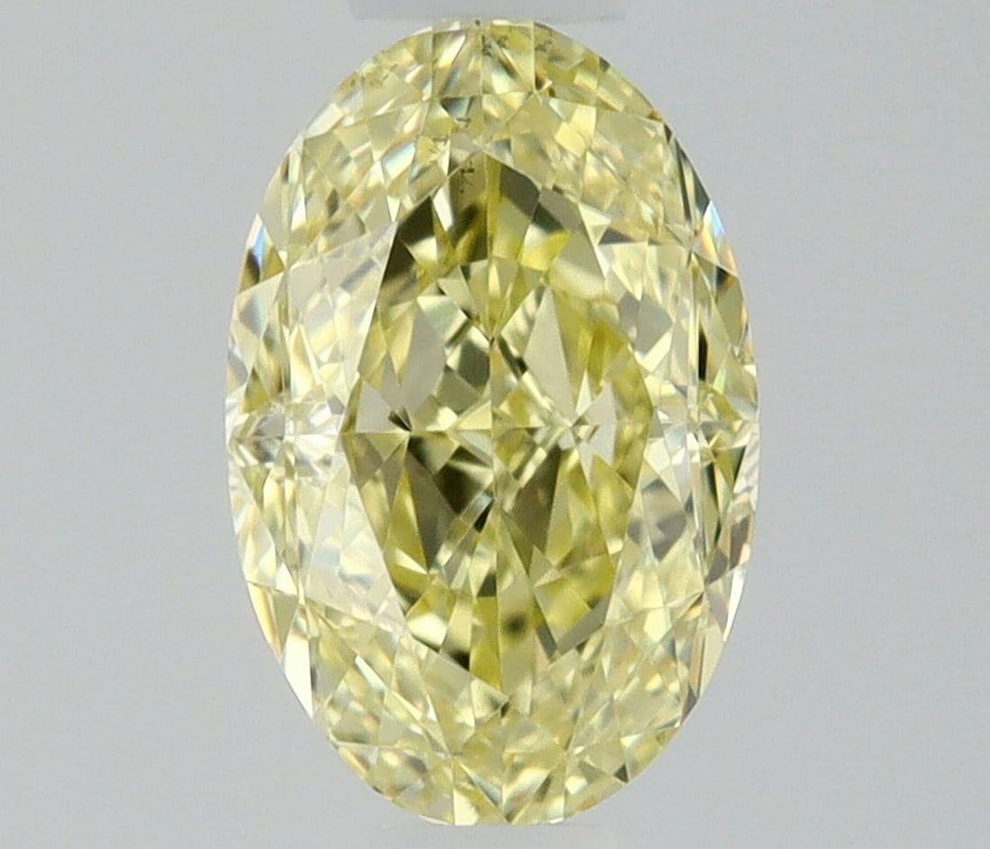 Loose Diamond - OVAL 0.5ct Fancy Yellow VS2: Loose Diamond - OVAL 0.5ct Fancy Yellow VS2 Source: Natural Shape: OVAL Carats: 0.5 Color: Fancy Yellow Certification: GIA Video: