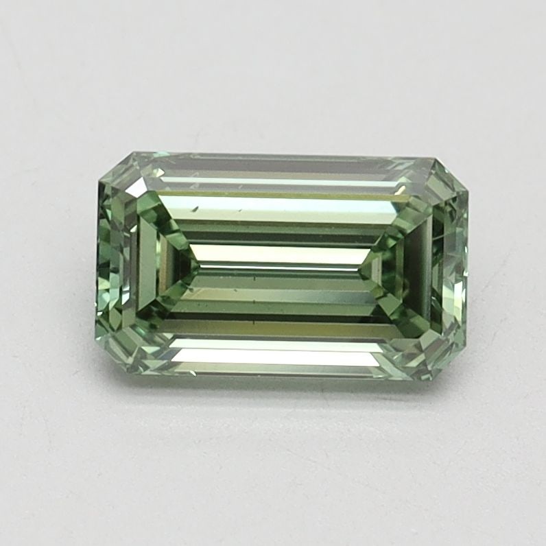 Loose Diamond - EMERALD 0.9ct Fancy Vivid Green VS2: Loose Diamond - EMERALD 0.9ct Fancy Vivid Green VS2 Source: This is a real non-mined Diamond that has been grown in a lab Shape: EMERALD Carats: 0.9 Color: Fancy Vivid Green Certification: IGI Video: