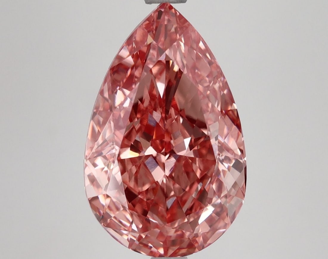 Loose Diamond - PEAR 5.19ct Fancy Vivid Pink VVS2: Loose Diamond - PEAR 5.19ct Fancy Vivid Pink VVS2 Source: This is a real non-mined Diamond that has been grown in a lab Shape: PEAR Carats: 5.19 Color: Fancy Vivid Pink Certification: IGI Video:
