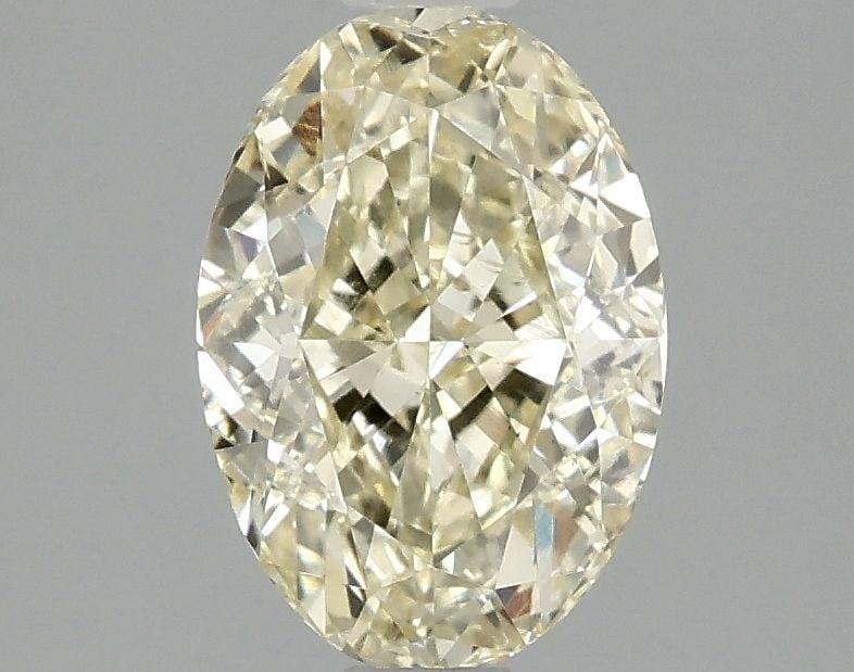 Loose Diamond - OVAL 2.0ct Fancy Yellow VS1: Loose Diamond - OVAL 2.0ct Fancy Yellow VS1 Source: This is a real non-mined Diamond that has been grown in a lab Shape: OVAL Carats: 2.0 Color: Fancy Yellow Certification: IGI Video: