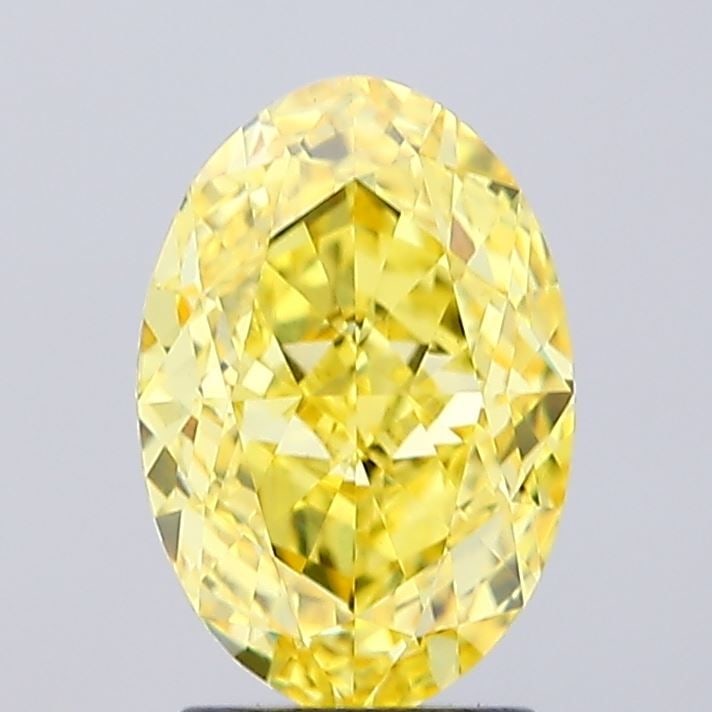Loose Diamond - OVAL 2.92ct Fancy Vivid Yellow VVS2: Loose Diamond - OVAL 2.92ct Fancy Vivid Yellow VVS2 Source: This is a real non-mined Diamond that has been grown in a lab Shape: OVAL Carats: 2.92 Color: Fancy Vivid Yellow Certification: IGI Video: