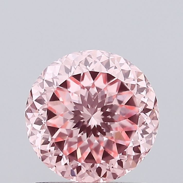 Loose Diamond - ROUND 1.14ct Fancy Vivid Pink VS1: Loose Diamond - ROUND 1.14ct Fancy Vivid Pink VS1 Source: This is a real non-mined Diamond that has been grown in a lab Shape: ROUND Carats: 1.14 Color: Fancy Vivid Pink Certification: IGI Video: