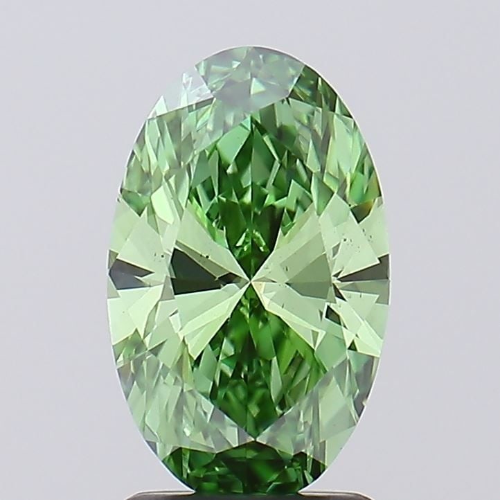 Loose Diamond - OVAL 1.62ct Fancy Vivid Green VS2: Loose Diamond - OVAL 1.62ct Fancy Vivid Green VS2 Source: This is a real non-mined Diamond that has been grown in a lab Shape: OVAL Carats: 1.62 Color: Fancy Vivid Green Certification: IGI Video: