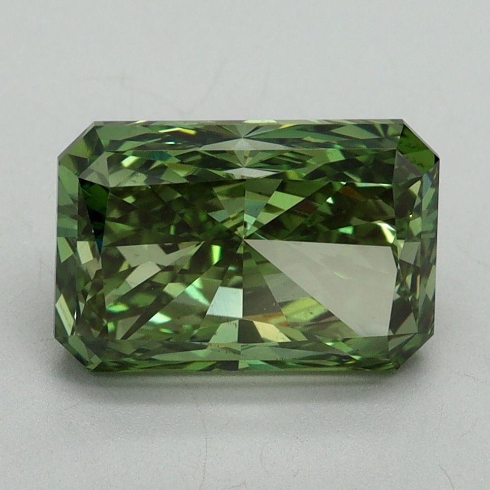 Loose Diamond - RADIANT 3.12ct Fancy Vivid Green VS2: Loose Diamond - RADIANT 3.12ct Fancy Vivid Green VS2 Source: This is a real non-mined Diamond that has been grown in a lab Shape: RADIANT Carats: 3.12 Color: Fancy Vivid Green Certification: IGI Video