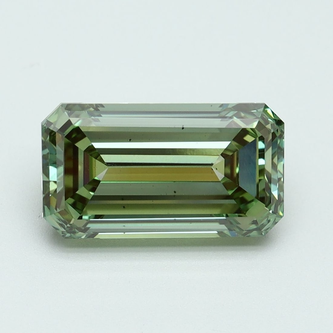 Loose Diamond - EMERALD 3.06ct Fancy Vivid Green VS2: Loose Diamond - EMERALD 3.06ct Fancy Vivid Green VS2 Source: This is a real non-mined Diamond that has been grown in a lab Shape: EMERALD Carats: 3.06 Color: Fancy Vivid Green Certification: IGI Video
