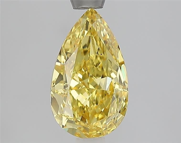 Loose Diamond - PEAR 1.57ct Fancy Vivid Yellow VS1: Loose Diamond - PEAR 1.57ct Fancy Vivid Yellow VS1 Source: This is a real non-mined Diamond that has been grown in a lab Shape: PEAR Carats: 1.57 Color: Fancy Vivid Yellow Certification: IGI Video: