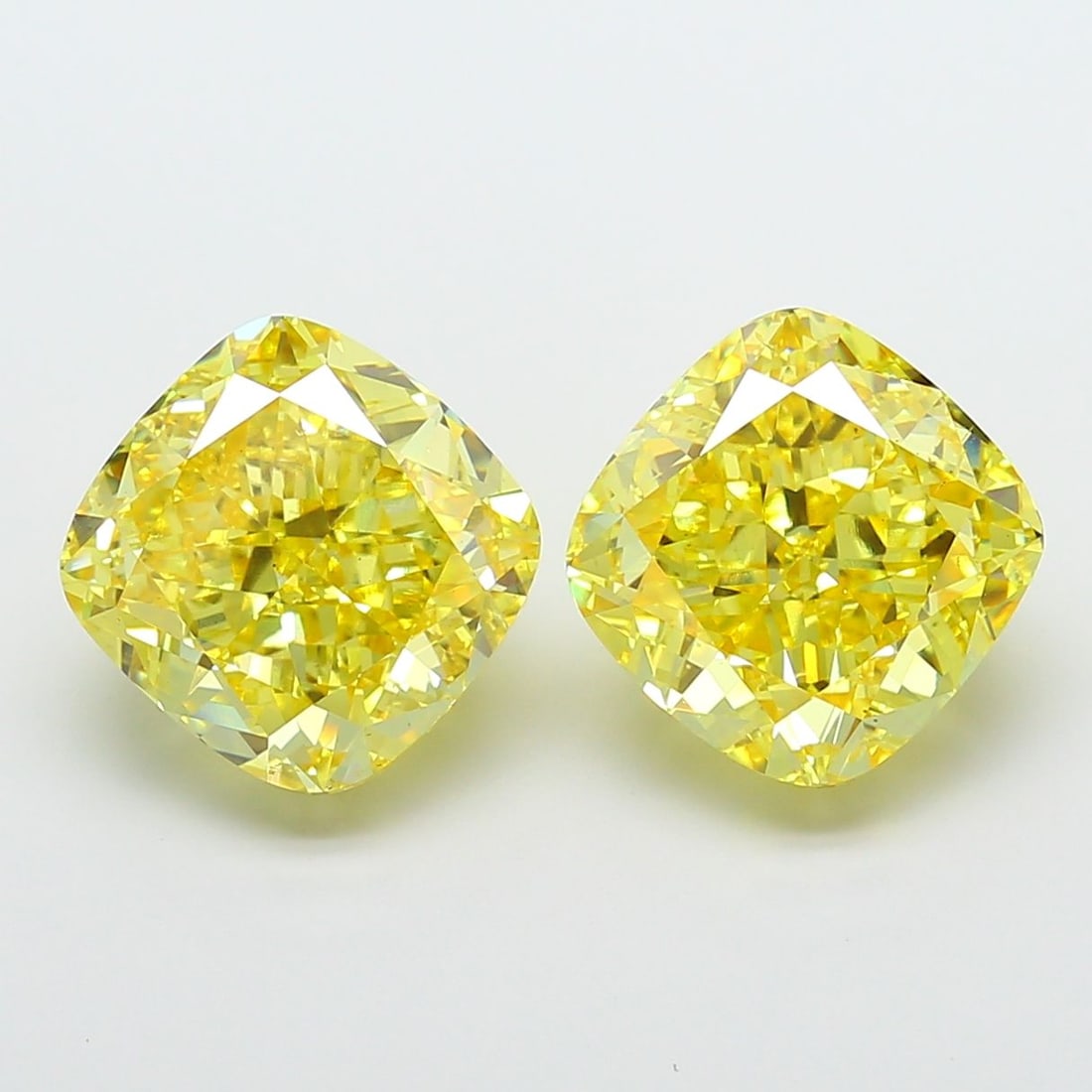 Loose Diamond - CUSHION MODIFIED 7.04ct Fancy Vivid Yellow VS2: Loose Diamond - CUSHION MODIFIED 7.04ct Fancy Vivid Yellow VS2 Source: This is a real non-mined Diamond that has been grown in a lab Shape: CUSHION MODIFIED Carats: 7.04 Color: Fancy Vivid Yellow Cert