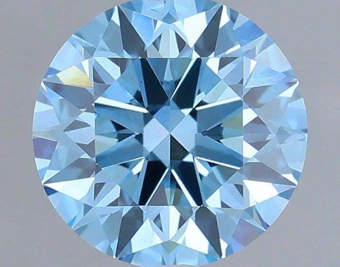 Ideal Loose Diamond - ROUND 0.7ct Fancy Vivid Blue VS1: Ideal Loose Diamond - ROUND 0.7ct Fancy Vivid Blue VS1 Source: This is a real non-mined Diamond that has been grown in a lab Shape: ROUND Carats: 0.7 Color: Fancy Vivid Blue Certification: IGI Video:
