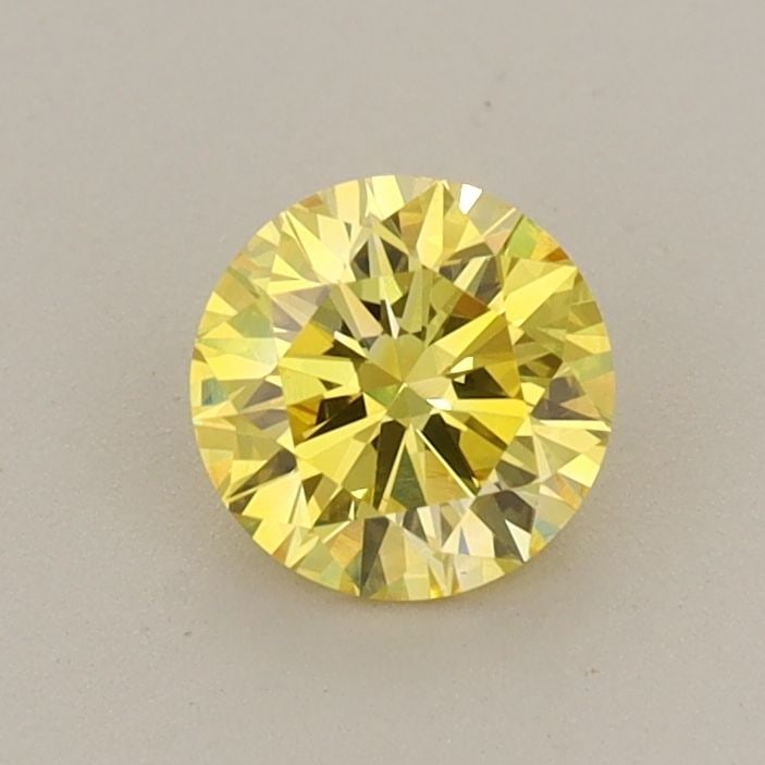 Loose Diamond - ROUND 0.59ct Fancy Vivid Yellow VS1: Loose Diamond - ROUND 0.59ct Fancy Vivid Yellow VS1 Source: This is a real non-mined Diamond that has been grown in a lab Shape: ROUND Carats: 0.59 Color: Fancy Vivid Yellow Certification: IGI Video: