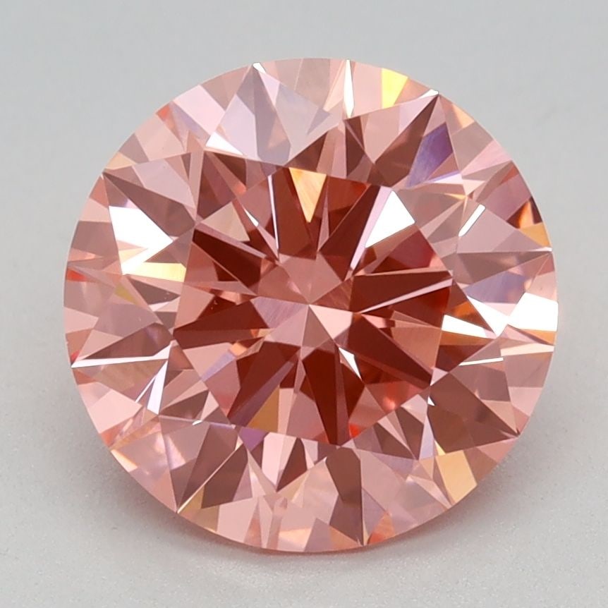 Ideal Loose Diamond - ROUND 2.1ct Fancy Vivid Pink VVS2: Ideal Loose Diamond - ROUND 2.1ct Fancy Vivid Pink VVS2 Source: This is a real non-mined Diamond that has been grown in a lab Shape: ROUND Carats: 2.1 Color: Fancy Vivid Pink Certification: IGI Video: