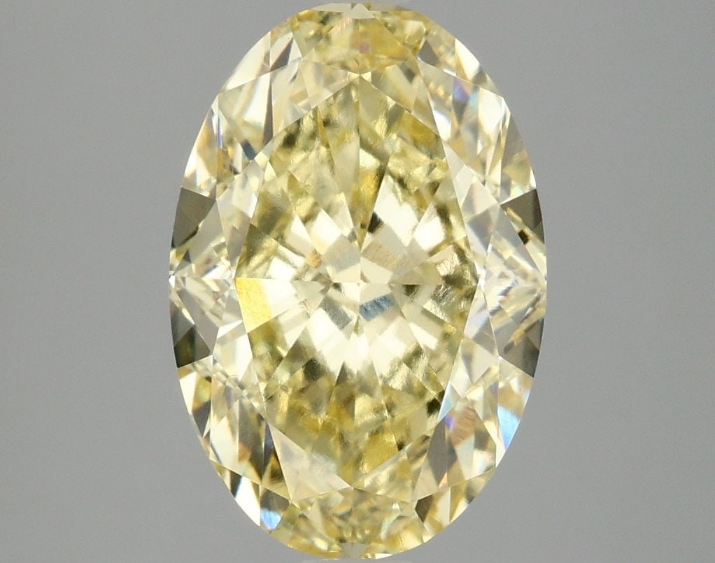 Loose Diamond - OVAL 4.1ct Fancy Vivid Yellow VS1: Loose Diamond - OVAL 4.1ct Fancy Vivid Yellow VS1 Source: This is a real non-mined Diamond that has been grown in a lab Shape: OVAL Carats: 4.1 Color: Fancy Vivid Yellow Certification: IGI Video: