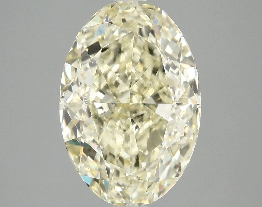 Loose Diamond - OVAL 4.01ct Fancy Vivid Yellow VS1: Loose Diamond - OVAL 4.01ct Fancy Vivid Yellow VS1 Source: This is a real non-mined Diamond that has been grown in a lab Shape: OVAL Carats: 4.01 Color: Fancy Vivid Yellow Certification: IGI Video: