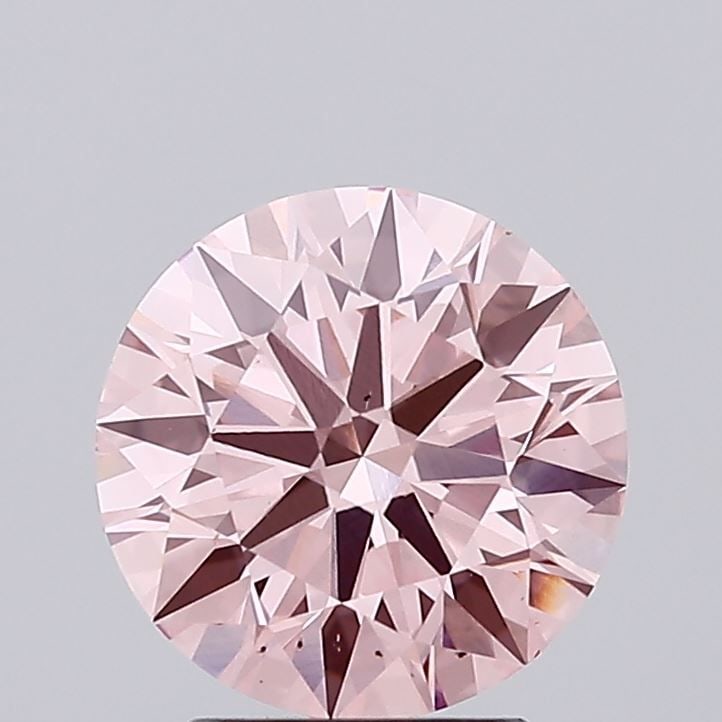 Ideal Loose Diamond - ROUND 2.44ct Fancy Vivid Pink VS2: Ideal Loose Diamond - ROUND 2.44ct Fancy Vivid Pink VS2 Source: This is a real non-mined Diamond that has been grown in a lab Shape: ROUND Carats: 2.44 Color: Fancy Vivid Pink Certification: IGI Video