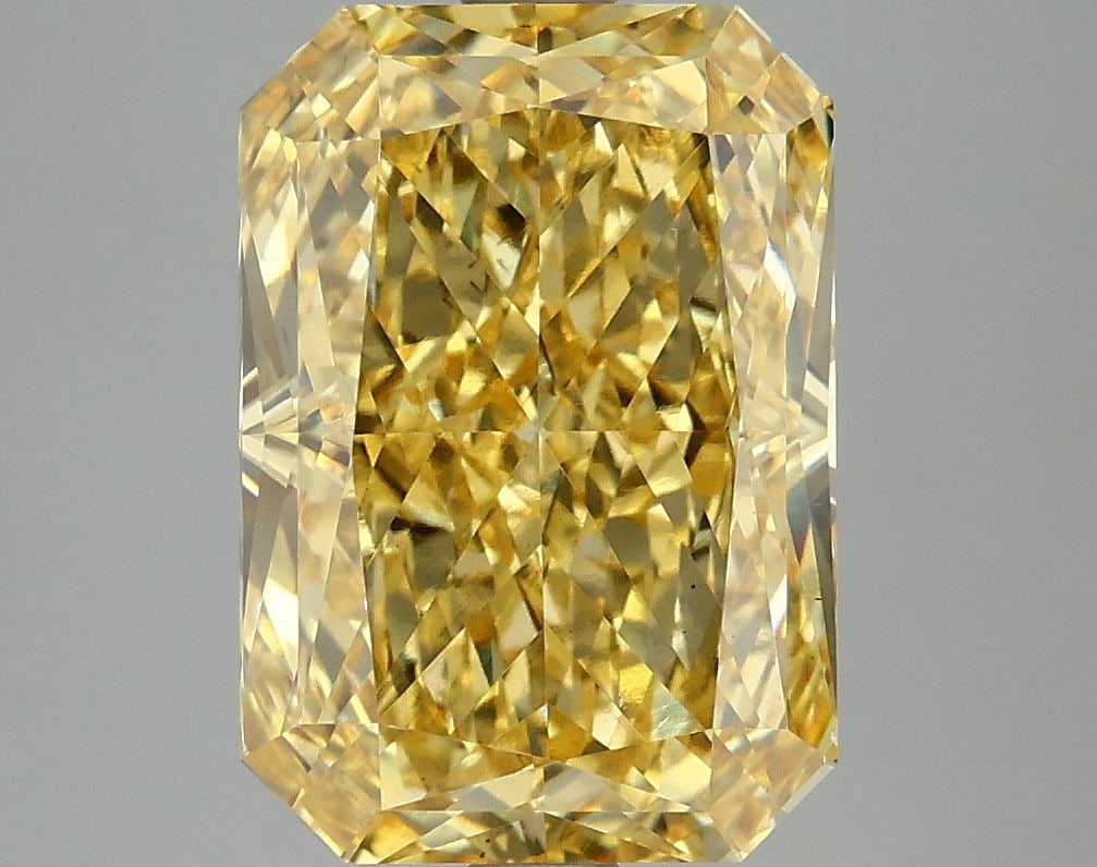 Loose Diamond - RADIANT 5.04ct Fancy Vivid Yellow VS2: Loose Diamond - RADIANT 5.04ct Fancy Vivid Yellow VS2 Source: This is a real non-mined Diamond that has been grown in a lab Shape: RADIANT Carats: 5.04 Color: Fancy Vivid Yellow Certification: IGI
