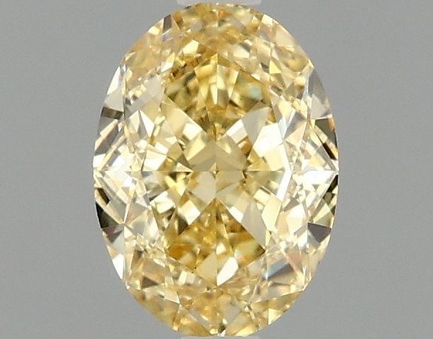 Loose Diamond - OVAL 1.03ct Fancy Vivid Yellow VS1: Loose Diamond - OVAL 1.03ct Fancy Vivid Yellow VS1 Source: This is a real non-mined Diamond that has been grown in a lab Shape: OVAL Carats: 1.03 Color: Fancy Vivid Yellow Certification: IGI Video:
