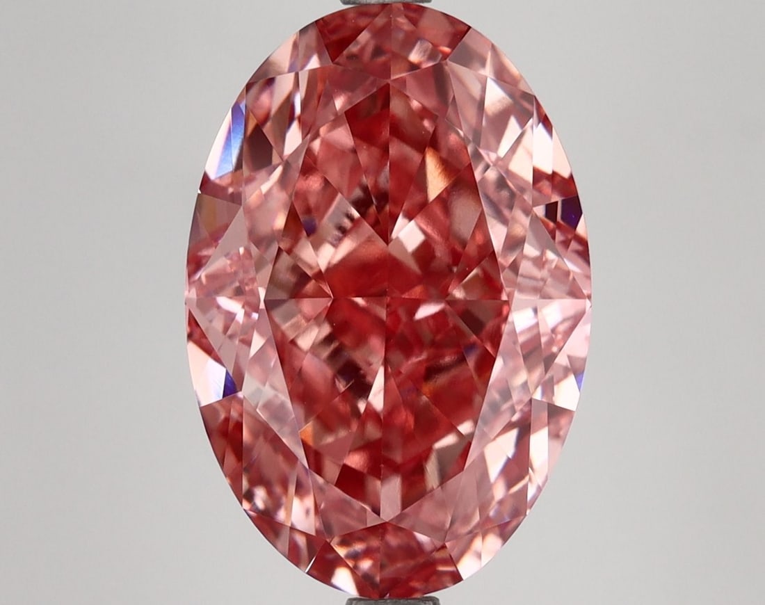 Loose Diamond - OVAL 7.14ct Fancy Vivid Pink VS1: Loose Diamond - OVAL 7.14ct Fancy Vivid Pink VS1 Source: This is a real non-mined Diamond that has been grown in a lab Shape: OVAL Carats: 7.14 Color: Fancy Vivid Pink Certification: IGI Video: