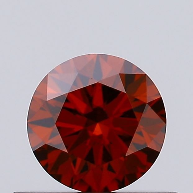 Loose Diamond - ROUND 0.36ct Fancy Deep Orange VS2: Loose Diamond - ROUND 0.36ct Fancy Deep Orange VS2 Source: This is a real non-mined Diamond that has been grown in a lab Shape: ROUND Carats: 0.36 Color: Fancy Deep Orange Certification: IGI Video: