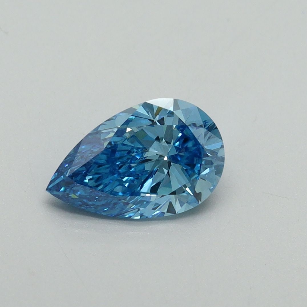 Loose Diamond - PEAR 1.0ct Fancy Vivid Blue VS1: Loose Diamond - PEAR 1.0ct Fancy Vivid Blue VS1 Source: This is a real non-mined Diamond that has been grown in a lab Shape: PEAR Carats: 1.0 Color: Fancy Vivid Blue Certification: IGI Video: