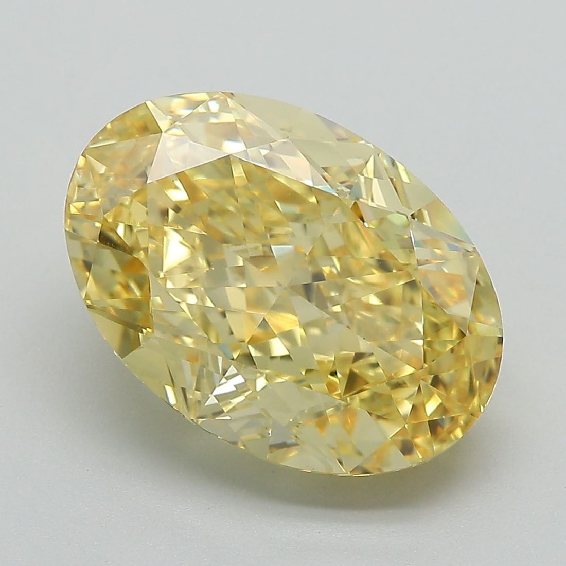 Loose Diamond - OVAL 6.08ct Fancy Vivid Yellow VS1: Loose Diamond - OVAL 6.08ct Fancy Vivid Yellow VS1 Source: This is a real non-mined Diamond that has been grown in a lab Shape: OVAL Carats: 6.08 Color: Fancy Vivid Yellow Certification: IGI Video: