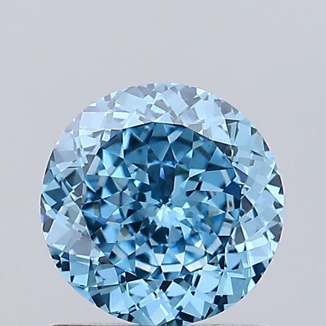 Loose Diamond - ROUND 0.77ct Fancy Vivid Blue VS1: Loose Diamond - ROUND 0.77ct Fancy Vivid Blue VS1 Source: This is a real non-mined Diamond that has been grown in a lab Shape: ROUND Carats: 0.77 Color: Fancy Vivid Blue Certification: IGI Video: