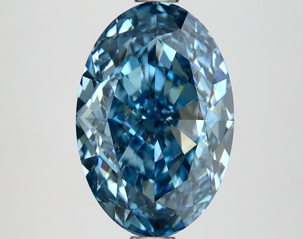 Loose Diamond - OVAL 3.09ct Fancy Vivid Blue VVS2: Loose Diamond - OVAL 3.09ct Fancy Vivid Blue VVS2 Source: This is a real non-mined Diamond that has been grown in a lab Shape: OVAL Carats: 3.09 Color: Fancy Vivid Blue Certification: IGI Video: