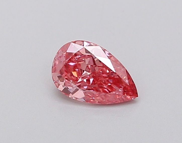 Loose Diamond - PEAR 0.3ct Fancy Vivid Pink VVS2: Loose Diamond - PEAR 0.3ct Fancy Vivid Pink VVS2 Source: This is a real non-mined Diamond that has been grown in a lab Shape: PEAR Carats: 0.3 Color: Fancy Vivid Pink Certification: IGI Video: