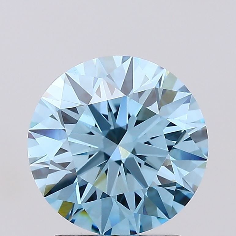 Ideal Loose Diamond - ROUND 2.04ct Fancy Vivid Blue VS1: Ideal Loose Diamond - ROUND 2.04ct Fancy Vivid Blue VS1 Source: This is a real non-mined Diamond that has been grown in a lab Shape: ROUND Carats: 2.04 Color: Fancy Vivid Blue Certification: IGI Video