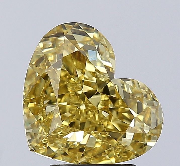 Loose Diamond - HEART 3.48ct Fancy Vivid Yellow VVS2: Loose Diamond - HEART 3.48ct Fancy Vivid Yellow VVS2 Source: This is a real non-mined Diamond that has been grown in a lab Shape: HEART Carats: 3.48 Color: Fancy Vivid Yellow Certification: IGI PLEASE