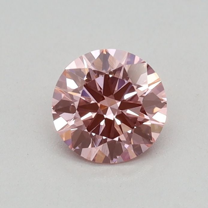 Loose Diamond - ROUND 0.32ct Fancy Vivid Pink VS1: Loose Diamond - ROUND 0.32ct Fancy Vivid Pink VS1 Source: This is a real non-mined Diamond that has been grown in a lab Shape: ROUND Carats: 0.32 Color: Fancy Vivid Pink Certification: IGI Video:
