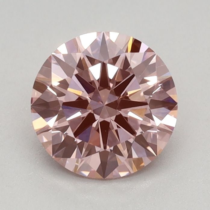 Ideal Loose Diamond - ROUND 0.7ct Fancy Vivid Pink VS1: Ideal Loose Diamond - ROUND 0.7ct Fancy Vivid Pink VS1 Source: This is a real non-mined Diamond that has been grown in a lab Shape: ROUND Carats: 0.7 Color: Fancy Vivid Pink Certification: IGI Video: