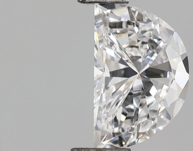 Loose Diamond - HALF MOON 0.51ct D VVS2: Loose Diamond - HALF MOON 0.51ct D VVS2 Source: This is a real non-mined Diamond that has been grown in a lab Shape: HALF MOON Carats: 0.51 Color: D Clarity: VVS2 Certification: IGI Video: