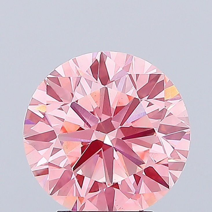 Loose Diamond - ROUND 4.12ct Fancy Vivid Pink VS1: Loose Diamond - ROUND 4.12ct Fancy Vivid Pink VS1 Source: This is a real non-mined Diamond that has been grown in a lab Shape: ROUND Carats: 4.12 Color: Fancy Vivid Pink Certification: IGI Video: