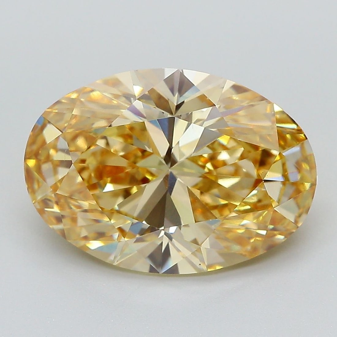 Loose Diamond - OVAL 6.05ct Fancy Vivid Orangey Yellow VS1: Loose Diamond - OVAL 6.05ct Fancy Vivid Orangey Yellow VS1 Source: This is a real non-mined Diamond that has been grown in a lab Shape: OVAL Carats: 6.05 Color: Fancy Vivid Orangey Yellow
