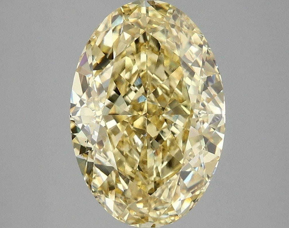 Loose Diamond - OVAL 4.1ct Fancy Vivid Yellow VS1: Loose Diamond - OVAL 4.1ct Fancy Vivid Yellow VS1 Source: This is a real non-mined Diamond that has been grown in a lab Shape: OVAL Carats: 4.1 Color: Fancy Vivid Yellow Certification: IGI Video: