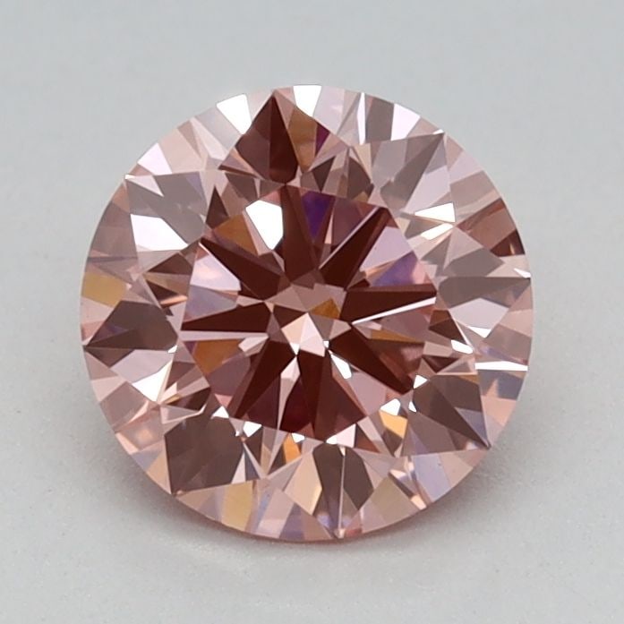 Loose Diamond - ROUND 0.81ct Fancy Vivid Pink VVS2: Loose Diamond - ROUND 0.81ct Fancy Vivid Pink VVS2 Source: This is a real non-mined Diamond that has been grown in a lab Shape: ROUND Carats: 0.81 Color: Fancy Vivid Pink Certification: IGI Video:
