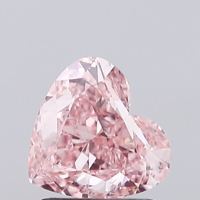 Loose Diamond - HEART 1.56ct Fancy Vivid Pink VS1: Loose Diamond - HEART 1.56ct Fancy Vivid Pink VS1 Source: This is a real non-mined Diamond that has been grown in a lab Shape: HEART Carats: 1.56 Color: Fancy Vivid Pink Certification: IGI Video: