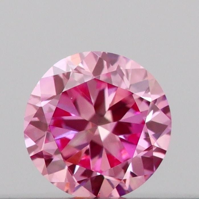 Loose Diamond - ROUND 0.1ct Fancy Vivid Pink VS1: Loose Diamond - ROUND 0.1ct Fancy Vivid Pink VS1 Source: This is a real non-mined Diamond that has been grown in a lab Shape: ROUND Carats: 0.1 Color: Fancy Vivid Pink Certification: IGI Video: