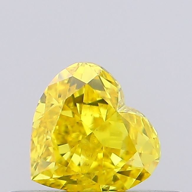 Loose Diamond - HEART 0.34ct Fancy Vivid Yellow VVS2: Loose Diamond - HEART 0.34ct Fancy Vivid Yellow VVS2 Source: This is a real non-mined Diamond that has been grown in a lab Shape: HEART Carats: 0.34 Color: Fancy Vivid Yellow Certification: NONE Video