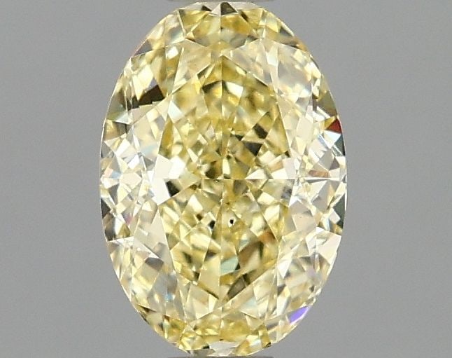 Loose Diamond - OVAL 1.1ct Fancy Intense Yellow VS2: Loose Diamond - OVAL 1.1ct Fancy Intense Yellow VS2 Source: This is a real non-mined Diamond that has been grown in a lab Shape: OVAL Carats: 1.1 Color: Fancy Intense Yellow Certification: IGI Video: