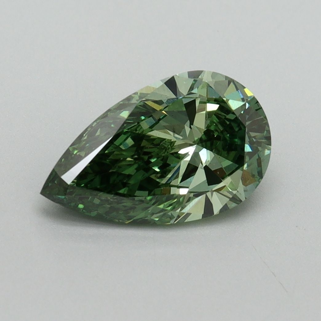 Loose Diamond - PEAR 1.5ct Fancy Vivid Green VS2: Loose Diamond - PEAR 1.5ct Fancy Vivid Green VS2 Source: This is a real non-mined Diamond that has been grown in a lab Shape: PEAR Carats: 1.5 Color: Fancy Vivid Green Certification: IGI Video: