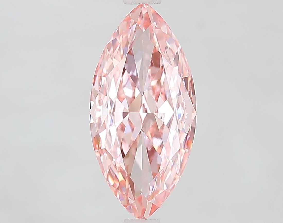 Loose Diamond - MARQUISE 2.31ct Fancy Vivid Pink VVS2: Loose Diamond - MARQUISE 2.31ct Fancy Vivid Pink VVS2 Source: This is a real non-mined Diamond that has been grown in a lab Shape: MARQUISE Carats: 2.31 Color: Fancy Vivid Pink Certification: IGI Vide