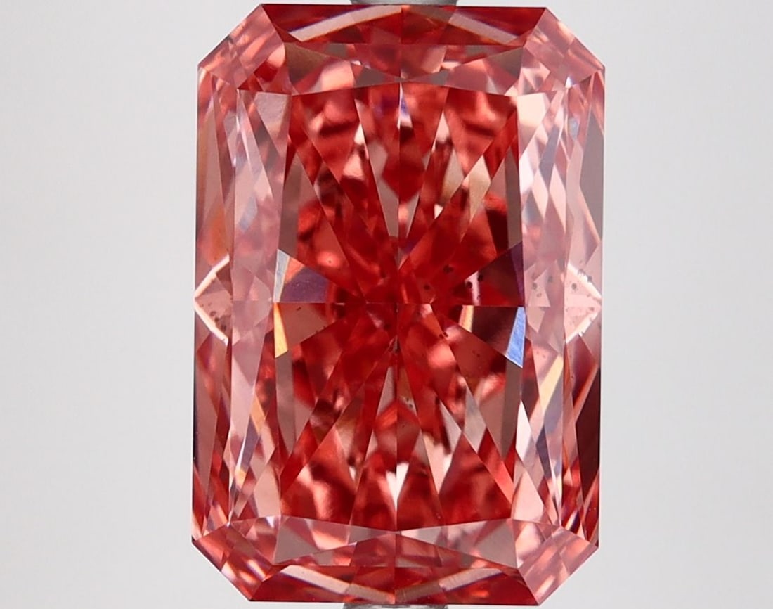 Loose Diamond - RADIANT 5.04ct Fancy Vivid Brownish Pink SI1: Loose Diamond - RADIANT 5.04ct Fancy Vivid Brownish Pink SI1 Source: This is a real non-mined Diamond that has been grown in a lab Shape: RADIANT Carats: 5.04 Color: Fancy Vivid Brownish Pink Certific