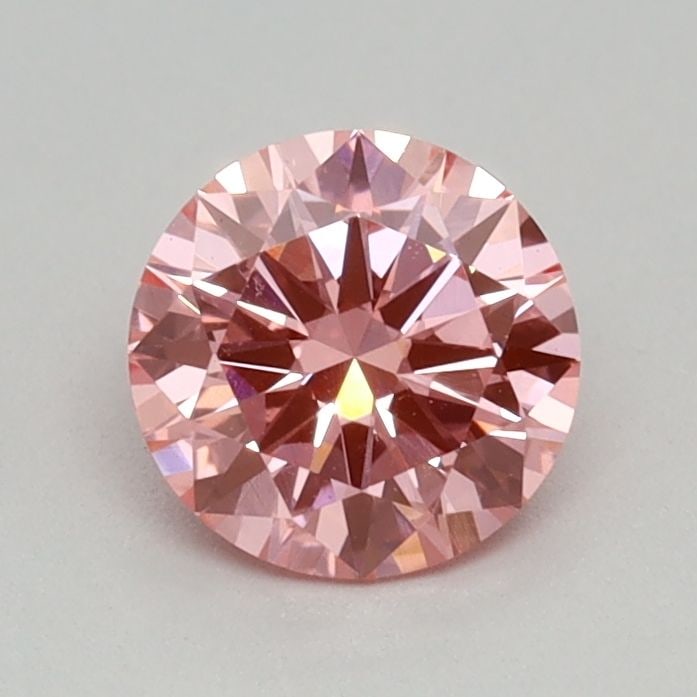 Loose Diamond - ROUND 0.4ct Fancy Vivid Pink VS1: Loose Diamond - ROUND 0.4ct Fancy Vivid Pink VS1 Source: This is a real non-mined Diamond that has been grown in a lab Shape: ROUND Carats: 0.4 Color: Fancy Vivid Pink Certification: IGI Video: